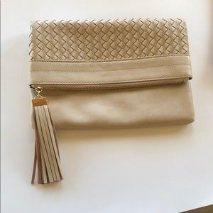 Tan clutch with a removable long strap
